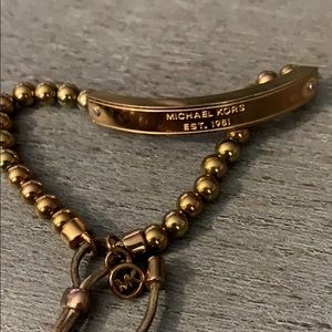 Michael Kors gold bracelet with gold beads